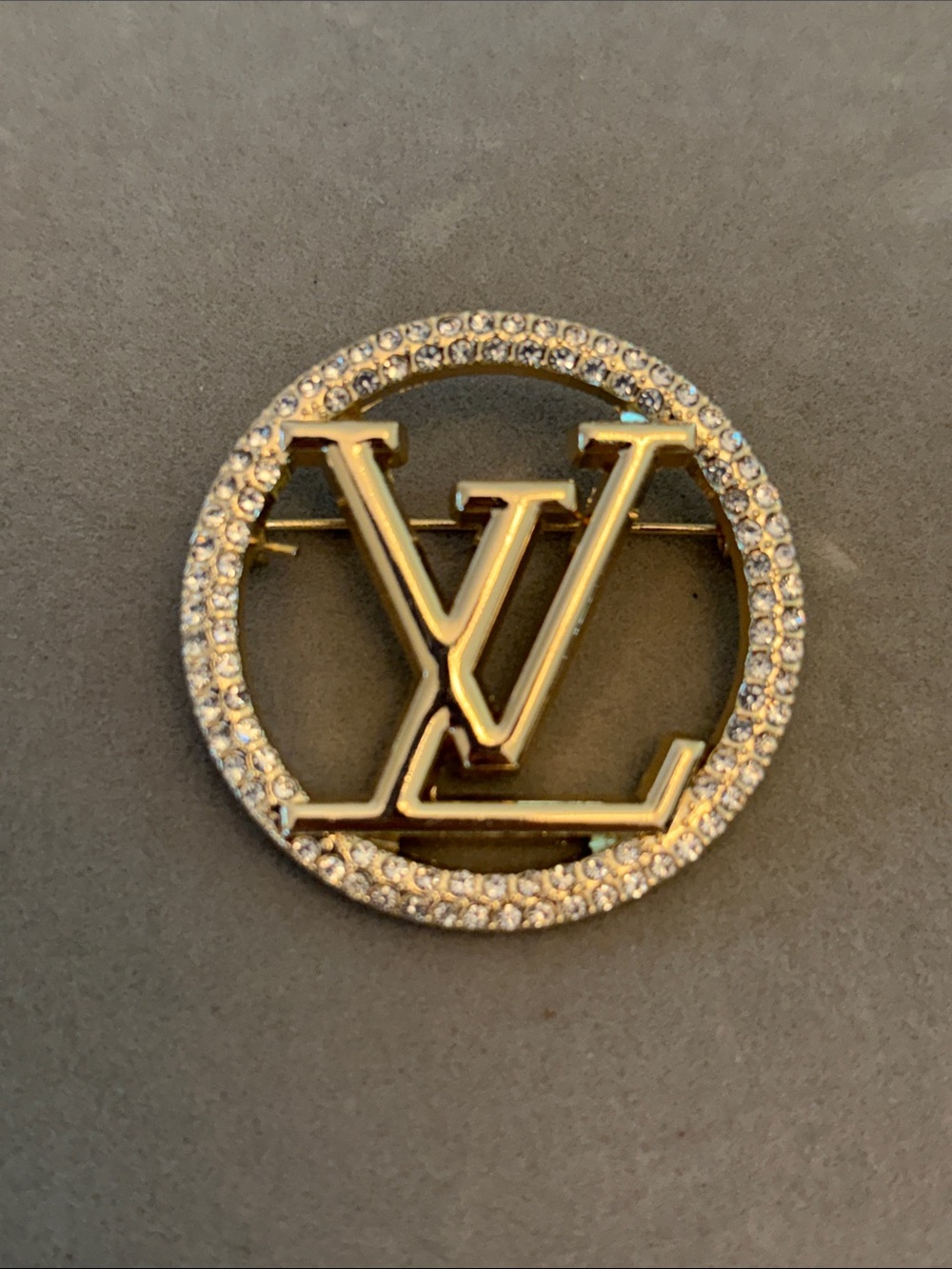 Gold and Clear Crystal Round Logo Brooch